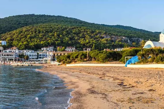 A church near a beach on Agistri, in the Saronic Gulf.