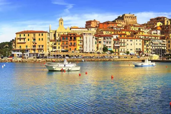 View of ​​the city from the sea, in Porto Santo Stefano.